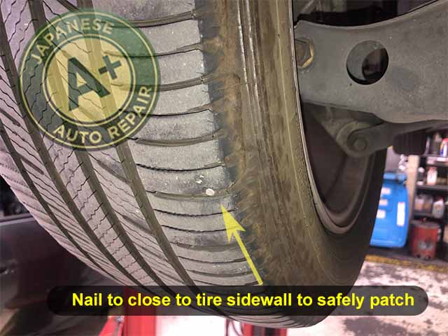 Image showing a nail to close to the tire sidewall to safely patch - A+ Japanese Auto Repair Inc. - San Carlos